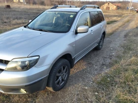 Обява за продажба на Mitsubishi Outlander 2.4 газ- бензин 4?4 ~6 800 лв. - изображение 1