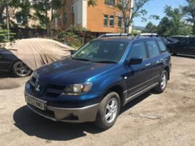 Mitsubishi Outlander 2.4iкожа автомат 1