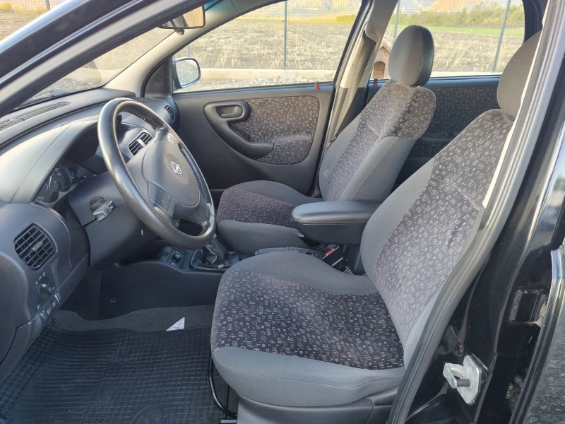 Opel Corsa 1.2i, снимка 10 - Автомобили и джипове - 52002682