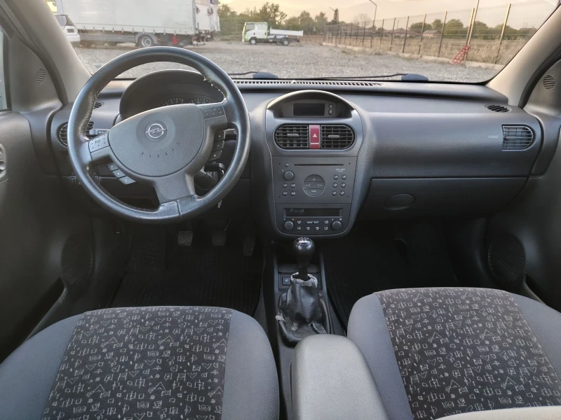 Opel Corsa 1.2i, снимка 9 - Автомобили и джипове - 52002682
