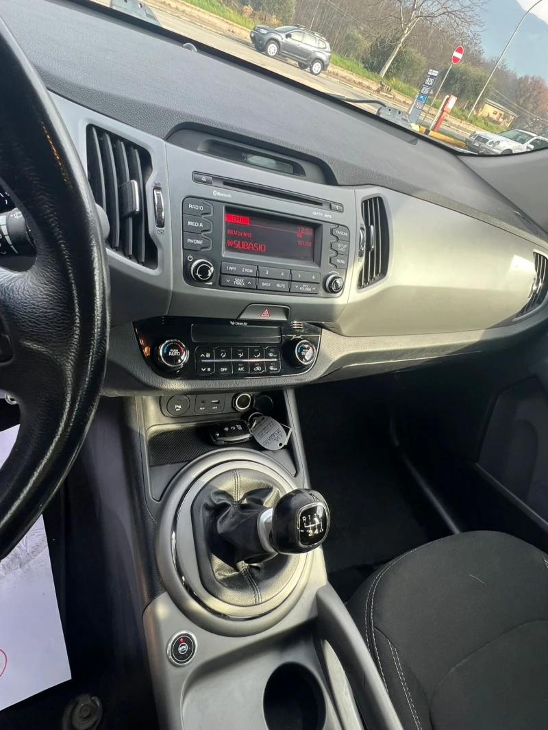 Kia Sportage 1.6I-GAZ-135кс, снимка 10 - Автомобили и джипове - 48578134