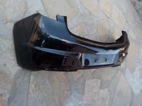 Задни брони за Опел Астра J, снимка 1