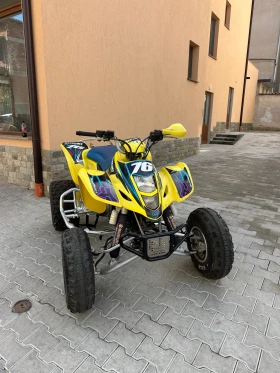 ������ Suzuki QuadSport
