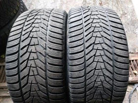 Гуми Зимни 245/40R18, снимка 1
