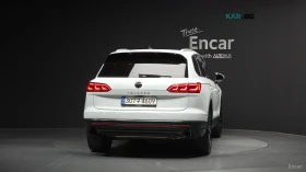 VW Touareg 3.0 TDI* PREMIUM* МАСАЖ* ДИСТРОНИК* ПАНО* ОБДУХВ* , снимка 4