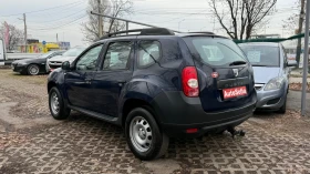 Dacia Duster 1.6i 4x4 климатик, снимка 3