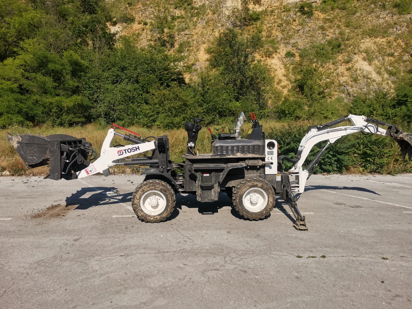 Багер Kubota Tosh