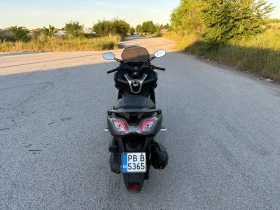 Kymco Downtown 350i 2022г., снимка 6