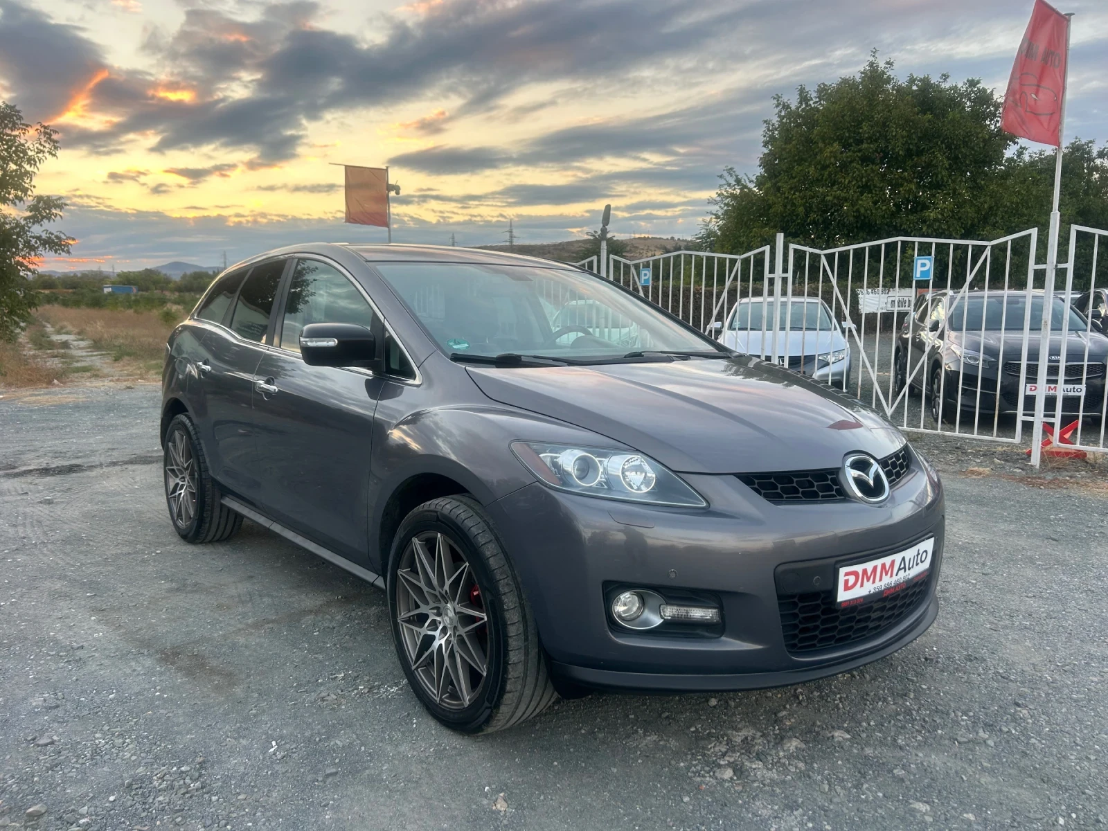 Mazda CX-7 4X4 / НАВИ / КОЖА / BOSE / БЕНЗИН / СТАВА НА ГАЗ  - изображение 3