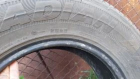 Гуми Всесезонни 235/70R16, снимка 9