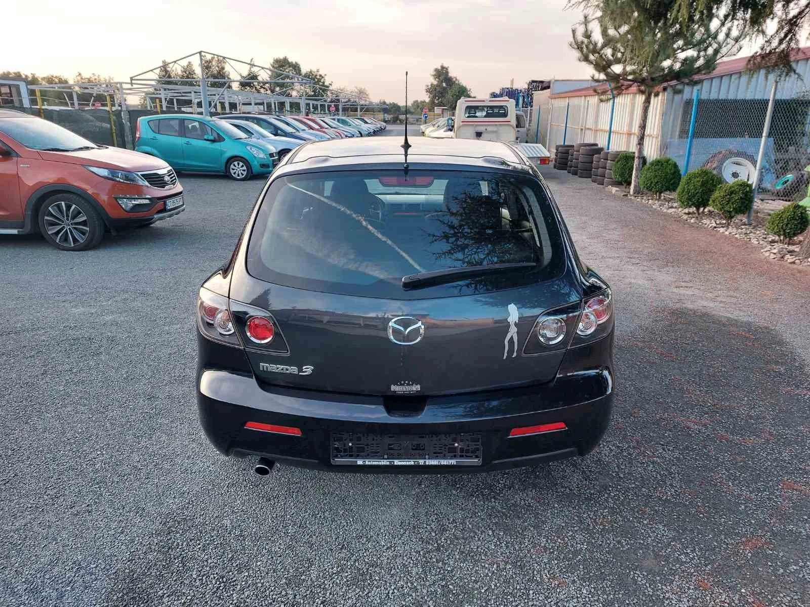 Mazda 3 1.6фейслифт - изображение 9