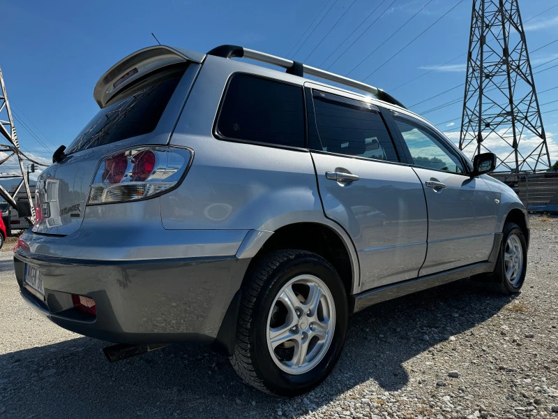 Mitsubishi Outlander 2.4 AWD / АВТОМАТ / ГАЗ / ИТАЛИЯ, снимка 8 - Автомобили и джипове - 45950913