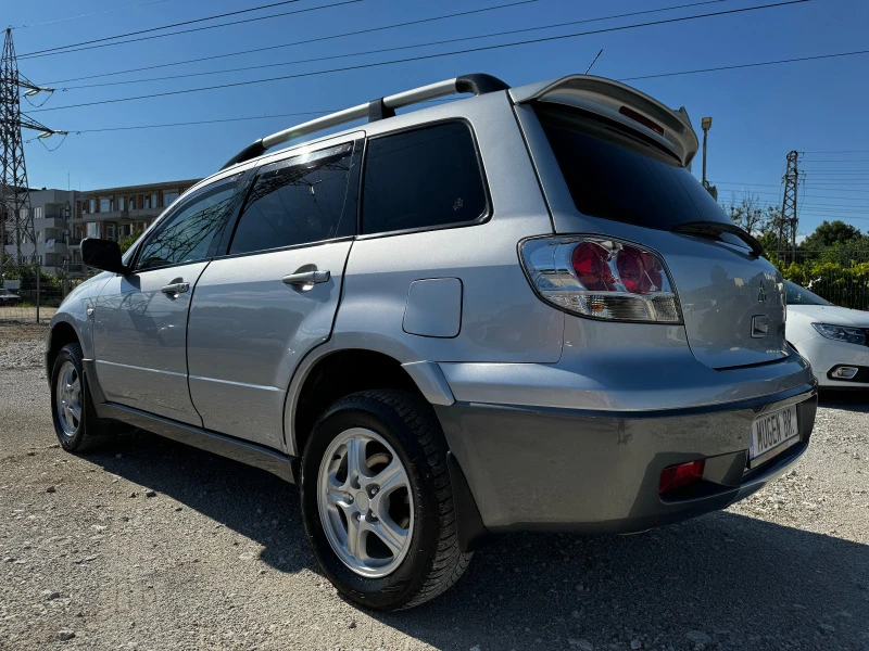 Mitsubishi Outlander 2.4 AWD / АВТОМАТ / ГАЗ / ИТАЛИЯ, снимка 6 - Автомобили и джипове - 45950913