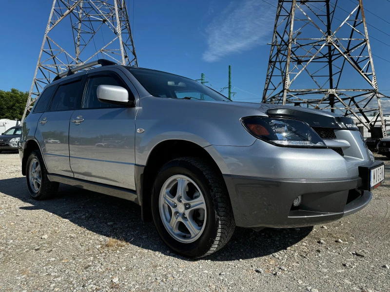 Mitsubishi Outlander 2.4 AWD / АВТОМАТ / ГАЗ / ИТАЛИЯ, снимка 5 - Автомобили и джипове - 45950913