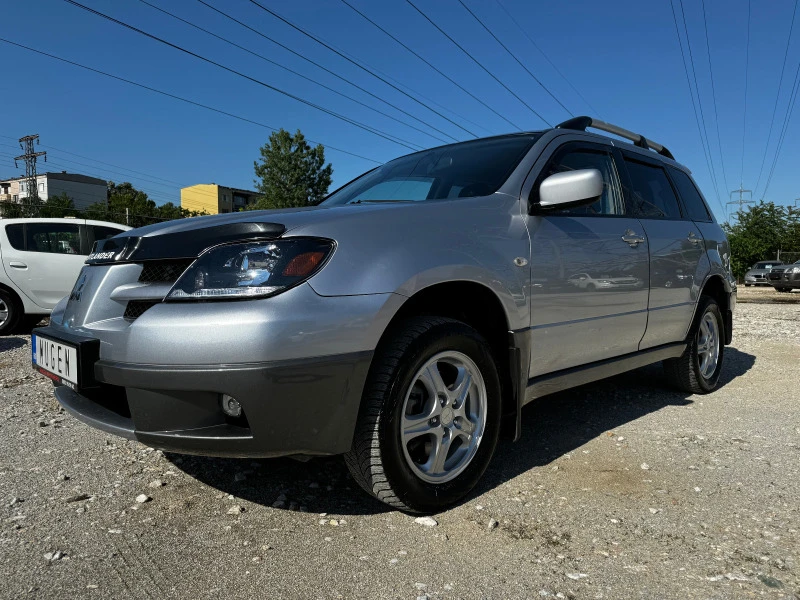 Mitsubishi Outlander 2.4 AWD / АВТОМАТ / ГАЗ / ИТАЛИЯ, снимка 2 - Автомобили и джипове - 45950913