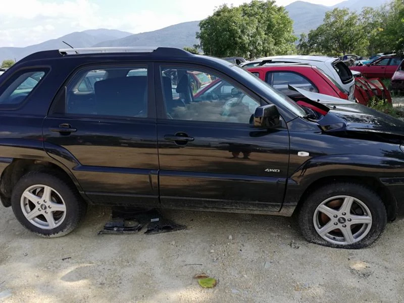 Kia Sportage, снимка 11 - Автомобили и джипове - 22315344