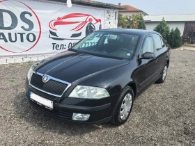     Skoda Octavia 1.6i . .