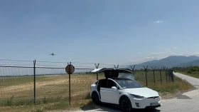     Tesla Model X    Supercharger* U* 6 