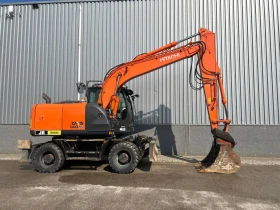 Багер Hitachi ZX 140 W-5, снимка 2