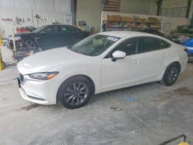 ������ Mazda 6