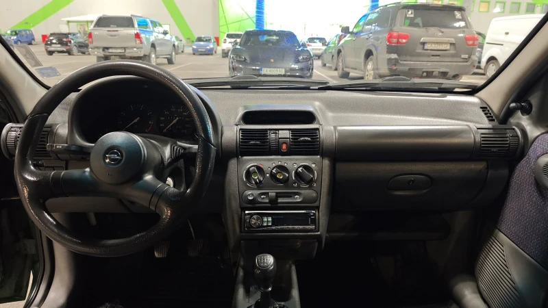 Opel Corsa 1.4 16V, снимка 11 - Автомобили и джипове - 53540703