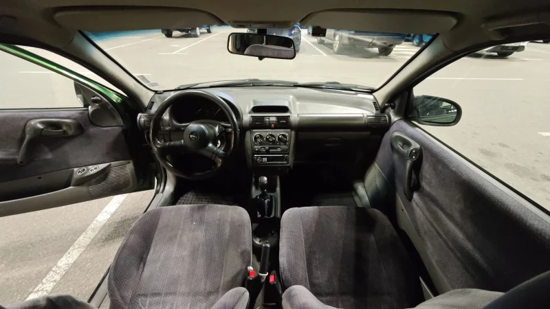 Opel Corsa 1.4 16V, снимка 12 - Автомобили и джипове - 53540703