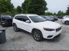 ������ Jeep Cherokee