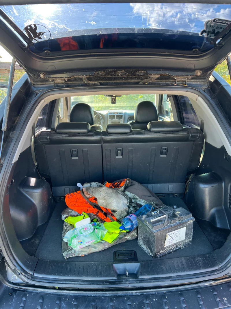 Kia Sportage, снимка 11 - Автомобили и джипове - 52725330