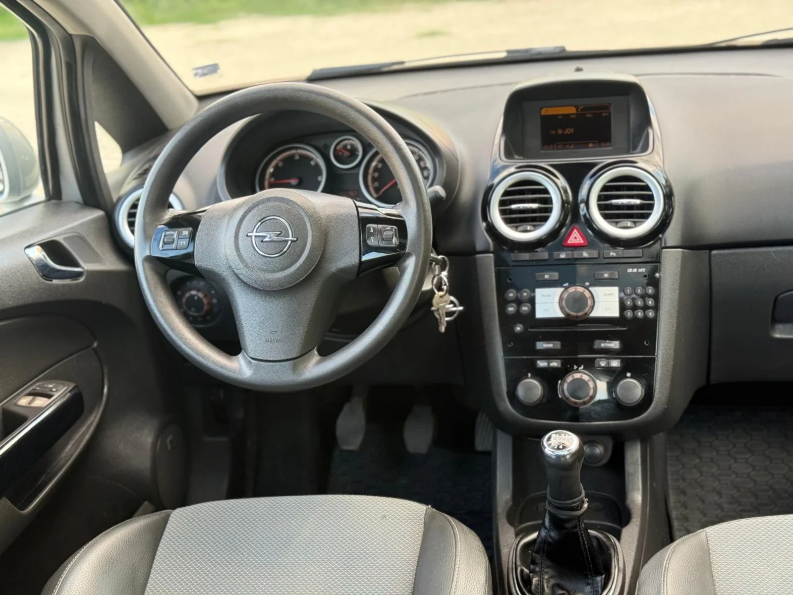 Opel Corsa 1.3CDTI/75ps/COSMO ИЗПЪЛН.+ FULL ЕКСТРИ/ОБСЛУЖЕНА , снимка 4 - Автомобили и джипове - 55449561