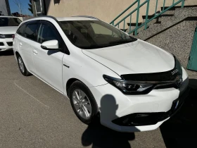 Toyota Auris 1.8 Hybrid e-cvt, снимка 1