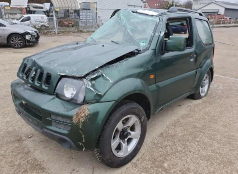 Suzuki Jimny 1.3i, снимка 4 - Автомобили и джипове - 48117776