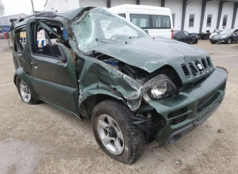 Suzuki Jimny 1.3i, снимка 5 - Автомобили и джипове - 48117776