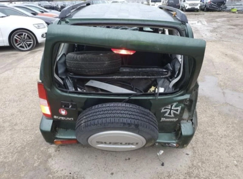 Suzuki Jimny 1.3i, снимка 2 - Автомобили и джипове - 48117776