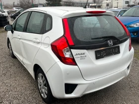 Honda Jazz 1.3i-VTEC AВТОМАТИК EURO6 - 13499 лв. - 26765853 | Car24.bg