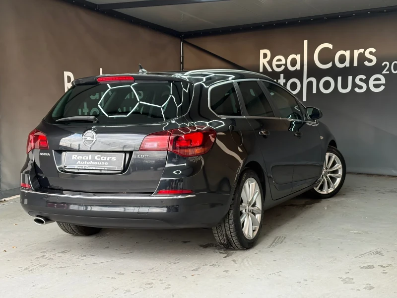 Opel Astra * 1.6d* SPORT TOURER* NAVI* PARK* , снимка 4 - Автомобили и джипове - 48364993