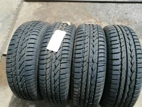 Гуми Зимни 235/75R15, снимка 2 - Гуми и джанти - 45447294