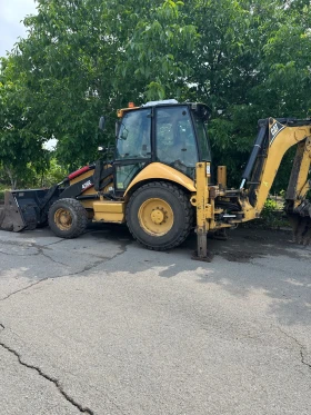 Багер Cat 428E, снимка 4