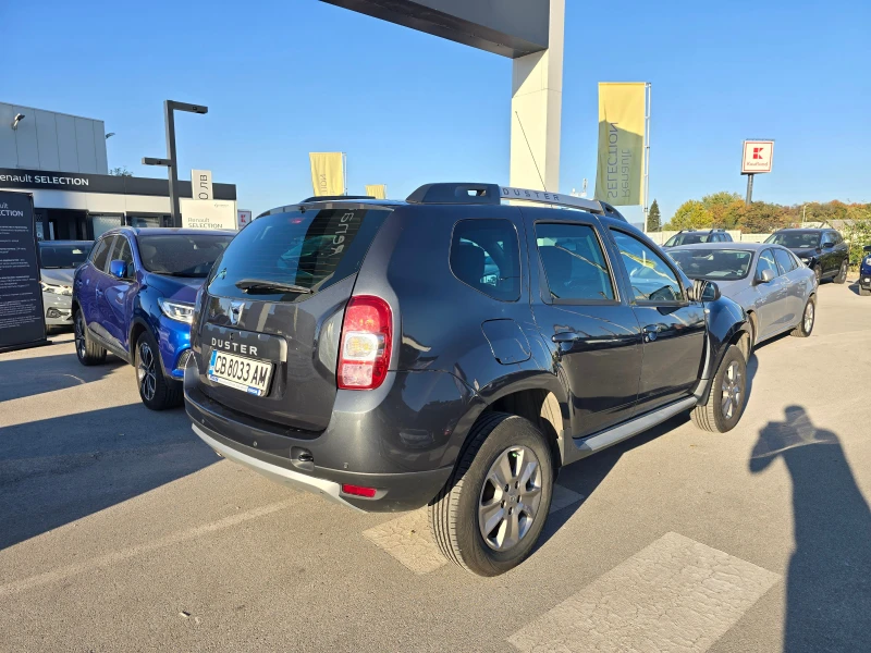 Dacia Duster 1.6i, снимка 5 - Автомобили и джипове - 47634401