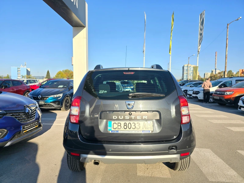 Dacia Duster 1.6i, снимка 4 - Автомобили и джипове - 47634401