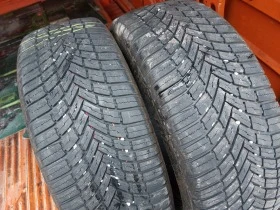 Гуми Зимни 235/45R18, снимка 4 - Гуми и джанти - 43836452