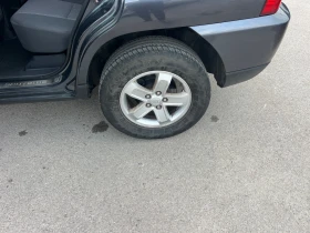 Kia Sportage 2.0i 4x4, снимка 11