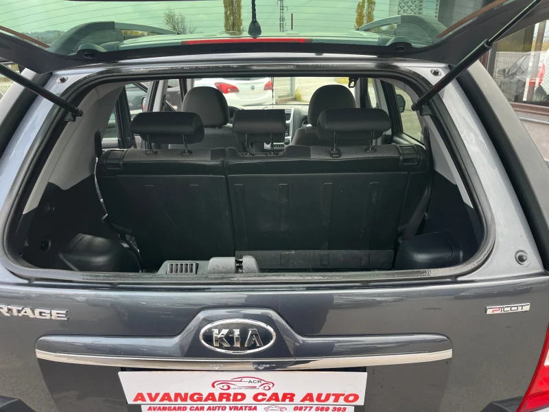 Kia Sportage 2.0i 4x4, снимка 12 - Автомобили и джипове - 47993443