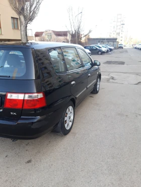 Kia Carens 2000 кубика, 113 к.с., снимка 6
