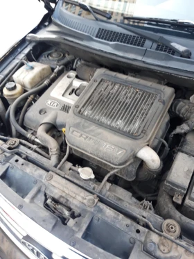 Kia Carens 2000 кубика, 113 к.с., снимка 4