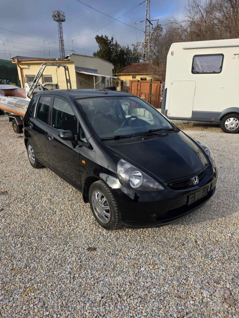 Honda Jazz 1.4-83кс, снимка 13 - Автомобили и джипове - 52886556