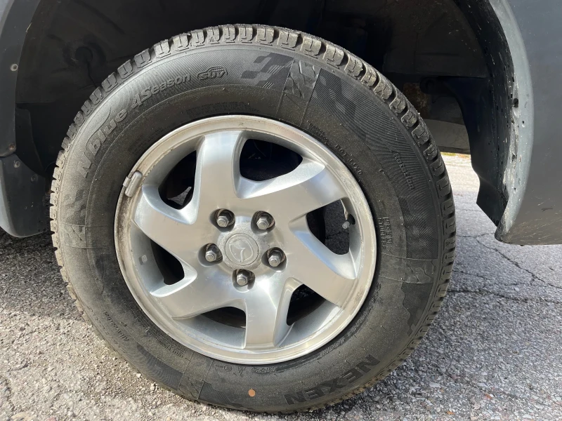 Mazda Tribute 2.0, снимка 15 - Автомобили и джипове - 52596901