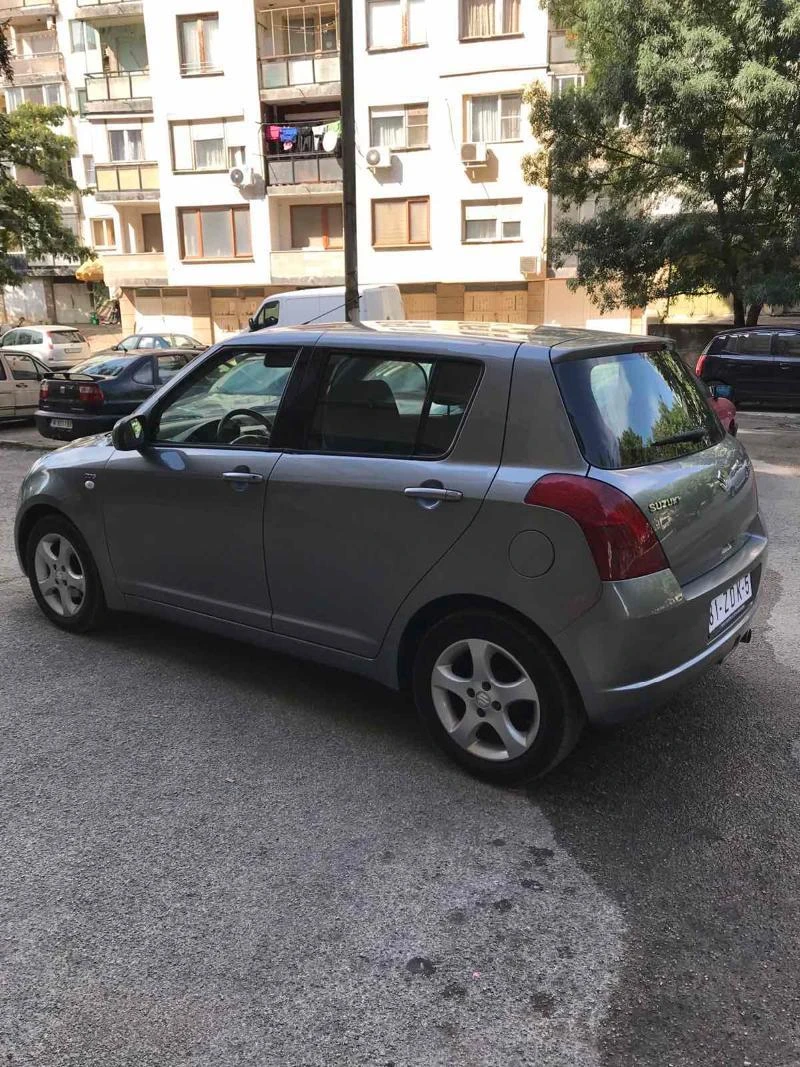 Suzuki Swift 1.3 DDiS, снимка 11 - Автомобили и джипове - 47481489