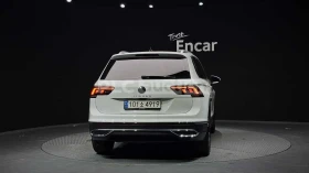 VW Tiguan ПОДГРЕВИ * КОЖЕН САЛОН * KEYLESS - 21900 € / 42832.68 лв. - 48308805 4