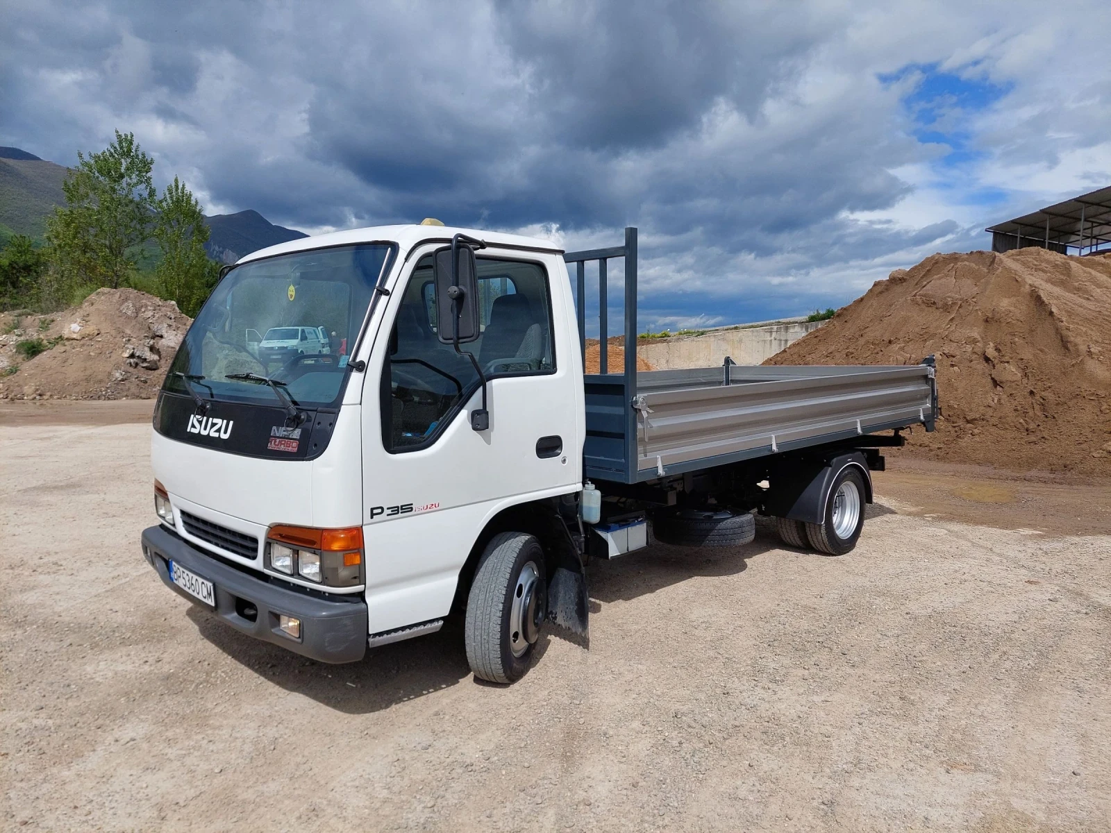 Isuzu Npr 2.8TDI Тристранен самосвал  | Auto.bg — изображение 1