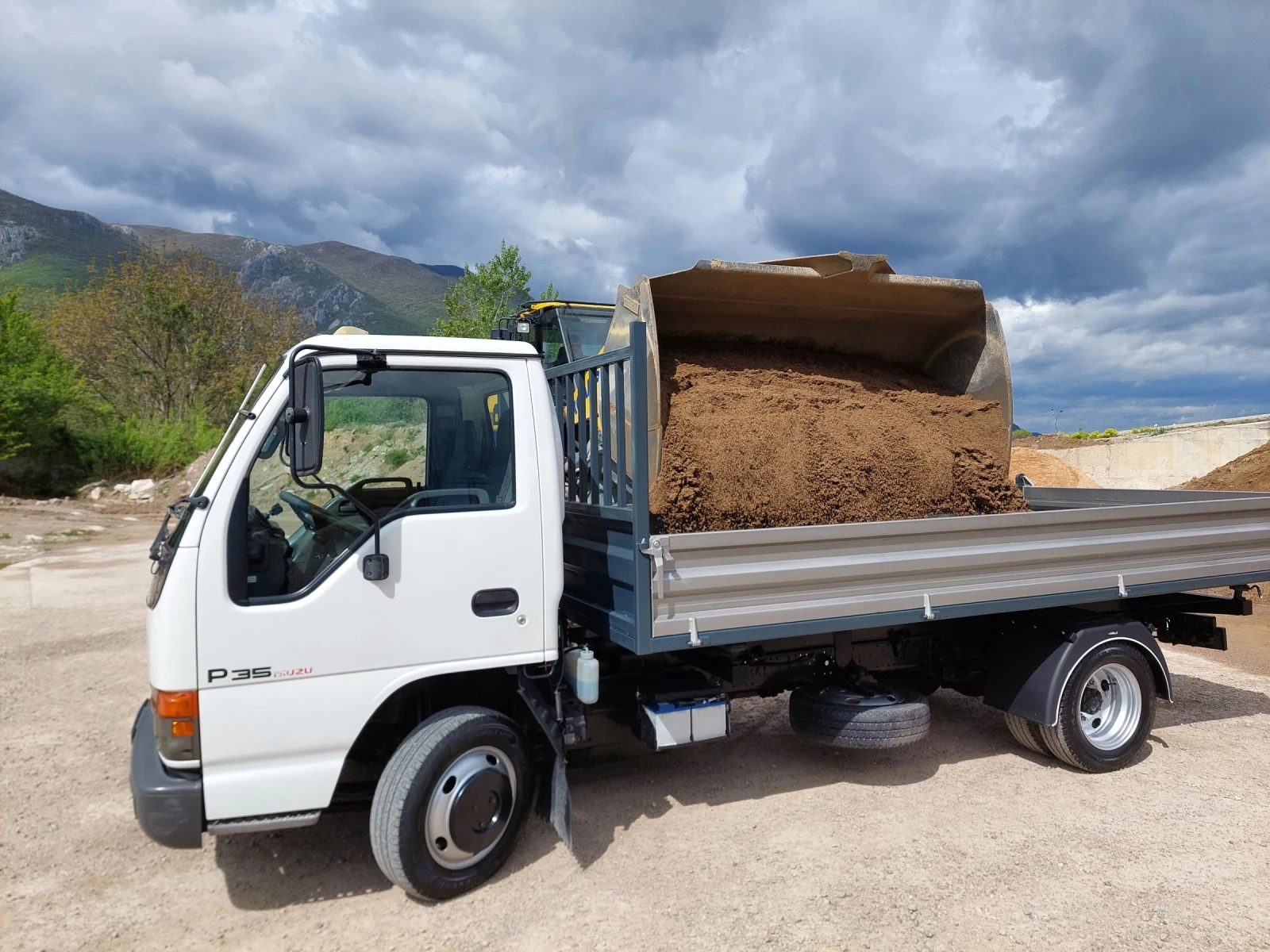 Isuzu Npr 2.8TDI Тристранен самосвал , снимка 3 - Камиони - 53952033